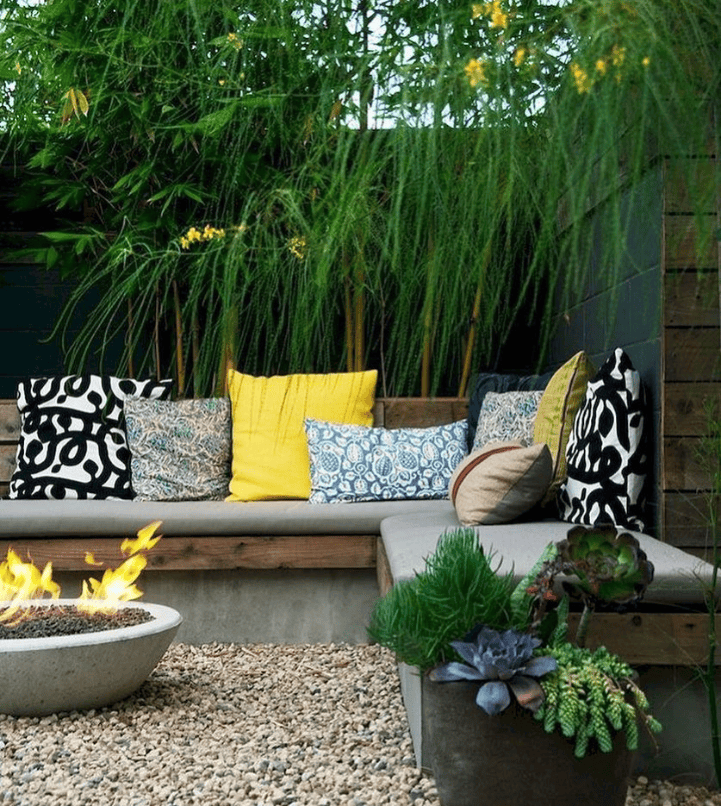 Modern Patio Sanctuary Featuring Fire Pit and Eye-Catching Accents