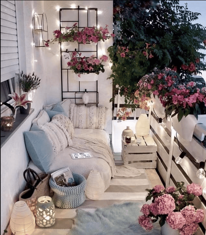 Romantic Bohemian Balcony with Ethereal Lighting and Blooms