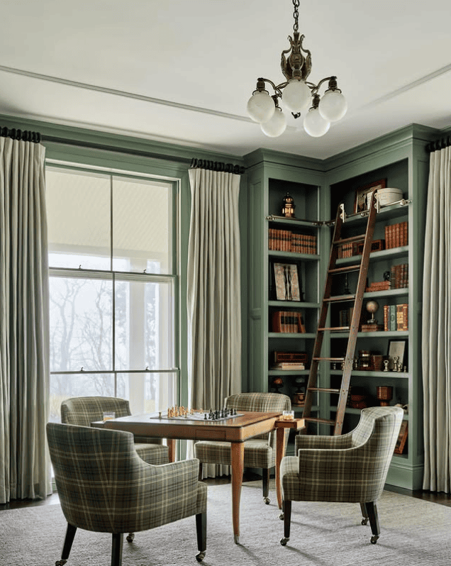 Timeless Green Library Enhanced by a Ladder and Game Table