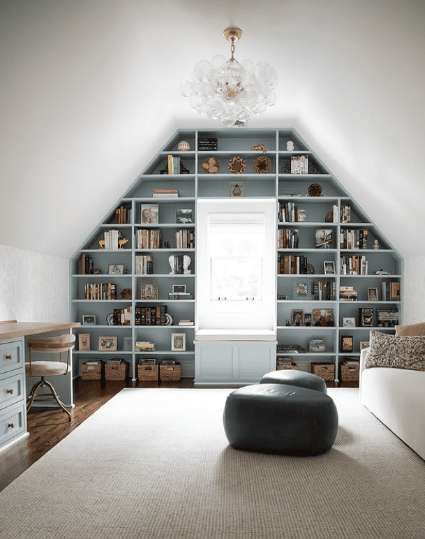 Stylish Attic Library Featuring Built-In Shelving