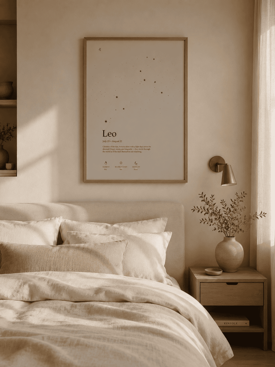 A framed print of the Leo constellation on a wall above a bed with neutral bedding and a wooden nightstand.
