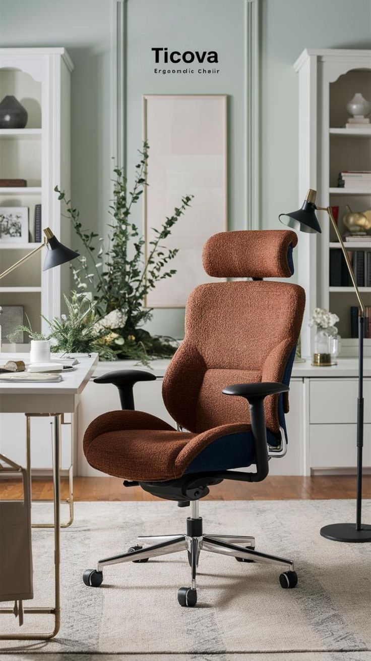 Close-up of an orange and blue ergonomic office chair with a textured finish and headrest in a home office setting.