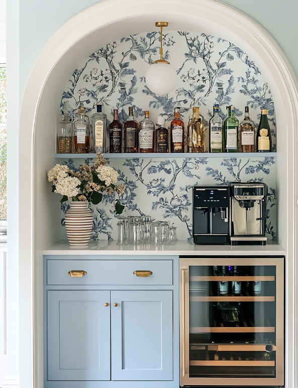 Charming Mini Bar with Blue Cabinetry and Floral Wallpaper