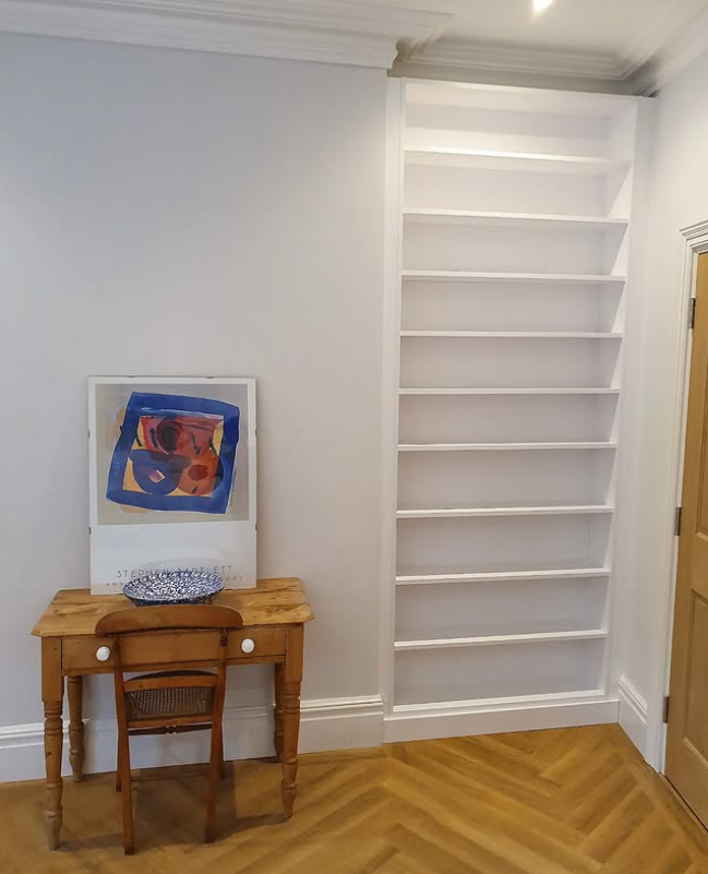 Slim floor-to-ceiling shelves