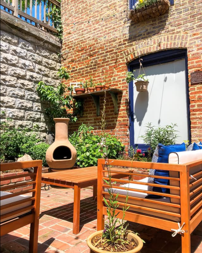 Sunny Urban Patio Featuring Brick Appeal