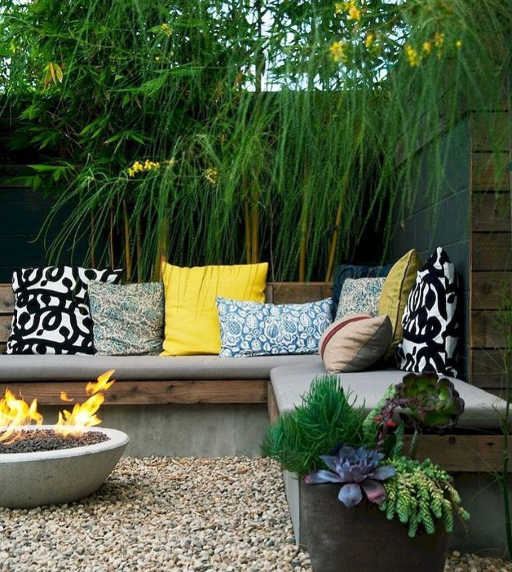 Modern Patio Sanctuary Featuring Fire Pit and Eye-Catching Accents