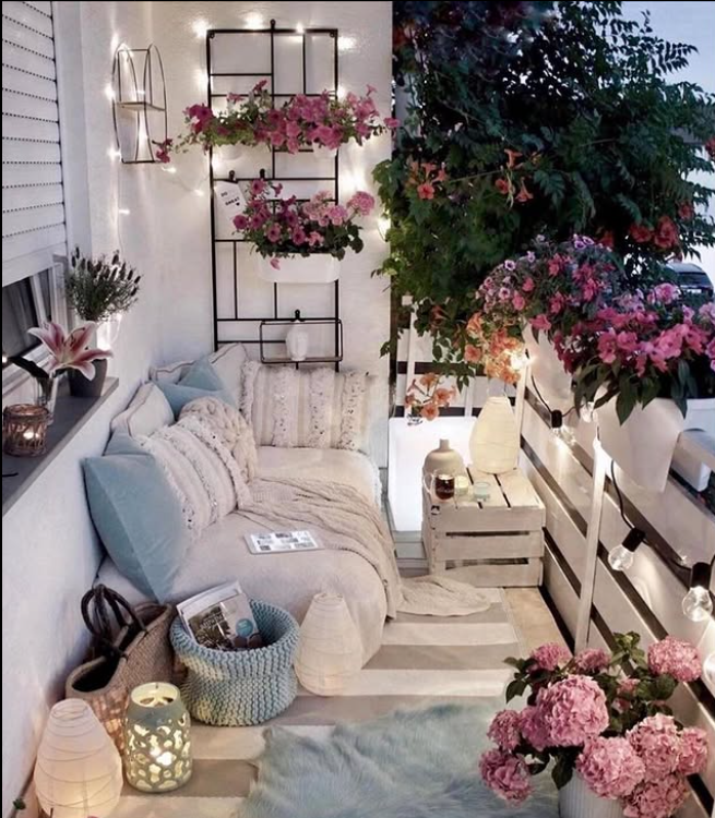 Romantic Bohemian Balcony with Ethereal Lighting and Blooms