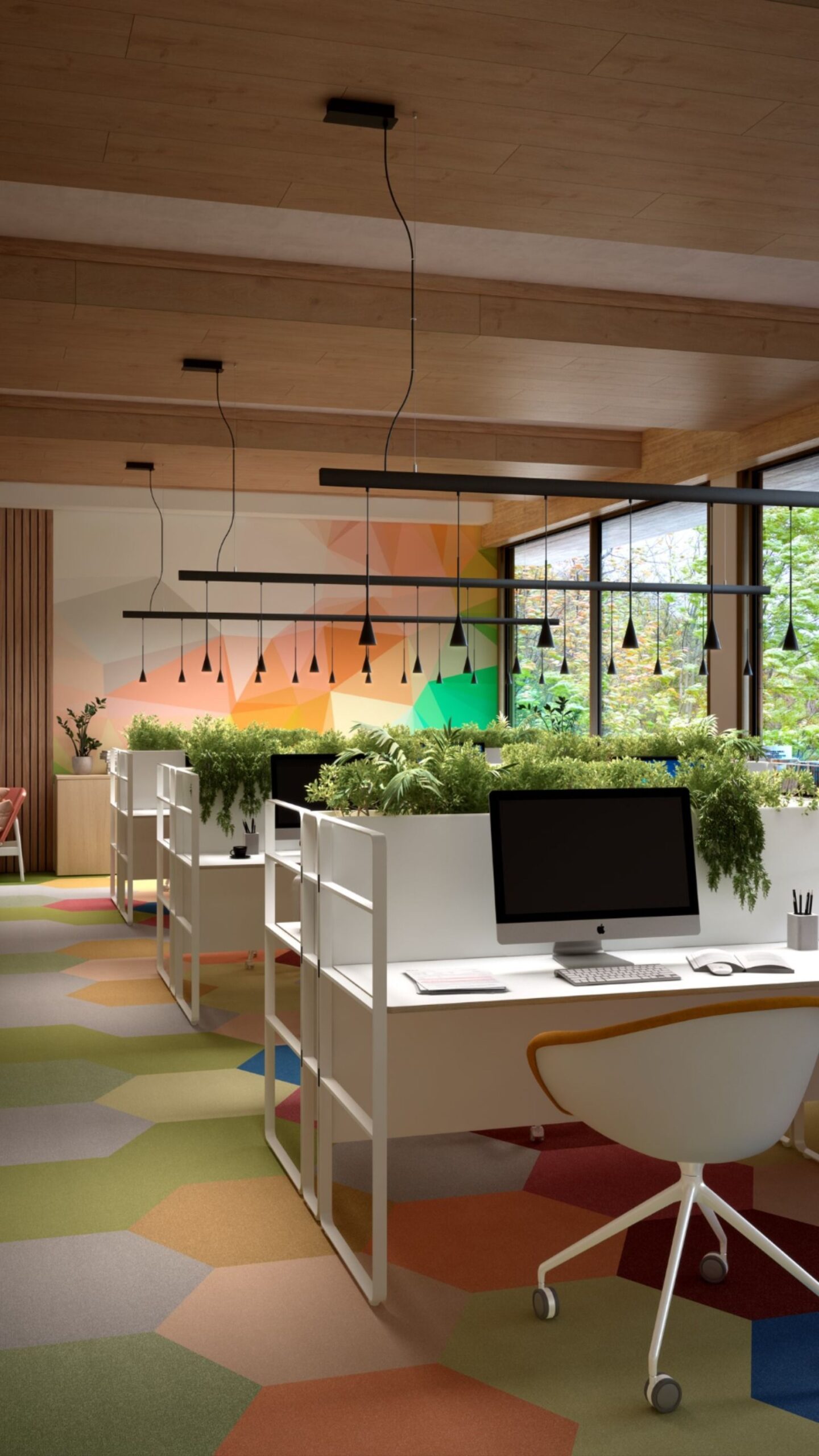 A modern office space with multiple white desks, ergonomic chairs, and green plants.