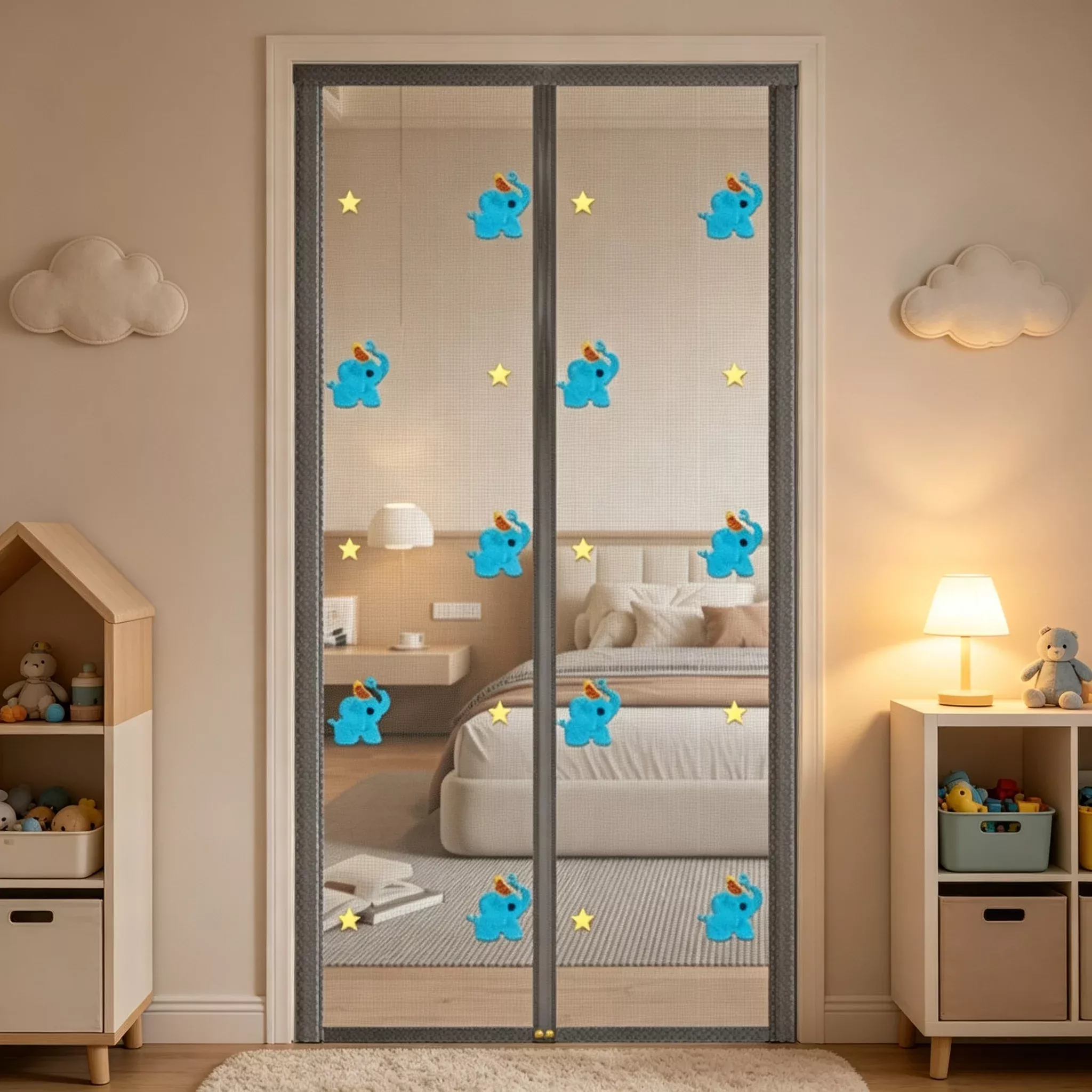 A magnetic mesh screen door with embroidered blue elephants and yellow stars covers an open doorway leading into a bedroom.