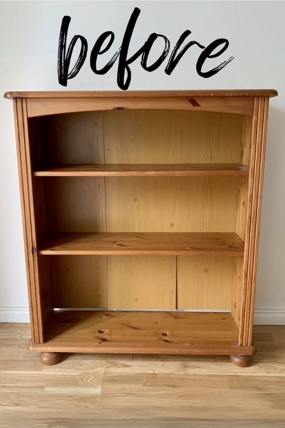 Before view of an unfinished light wood pine bookshelf with three shelves and rounded feet
