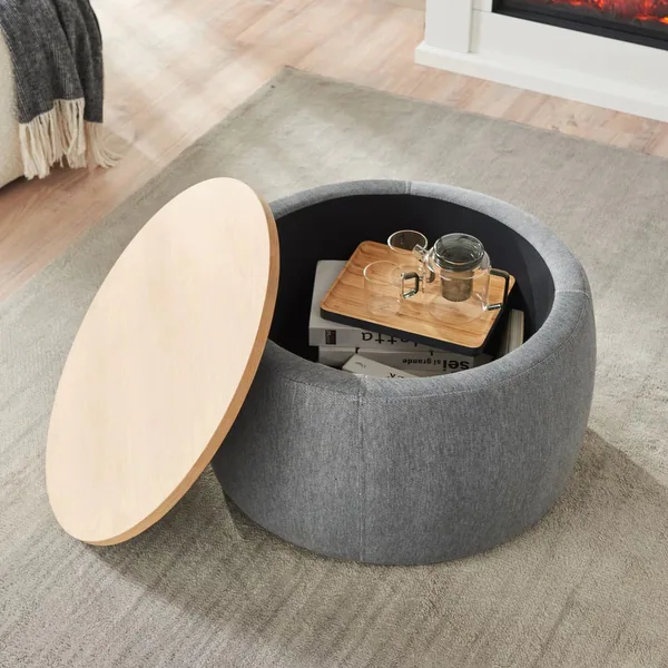 Round fabric storage ottoman with a removable wooden tabletop.